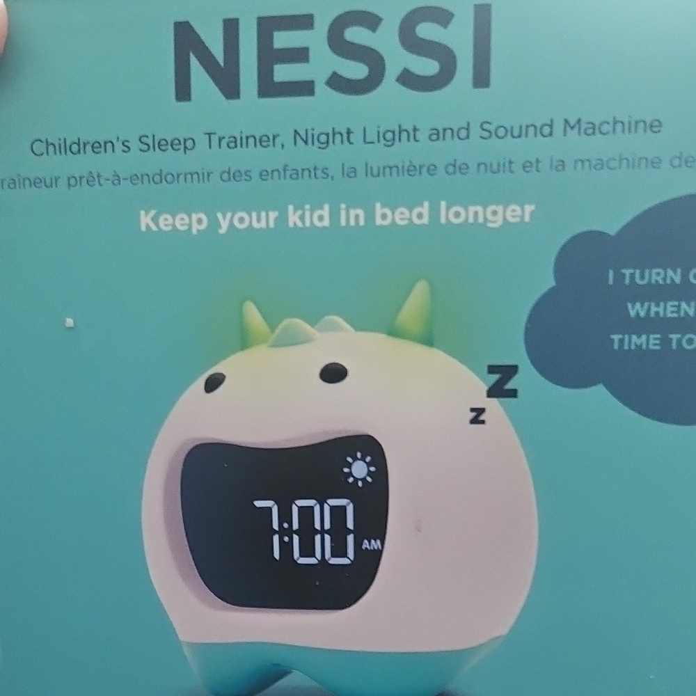 Green and White Learning Toy Sleep Trainer